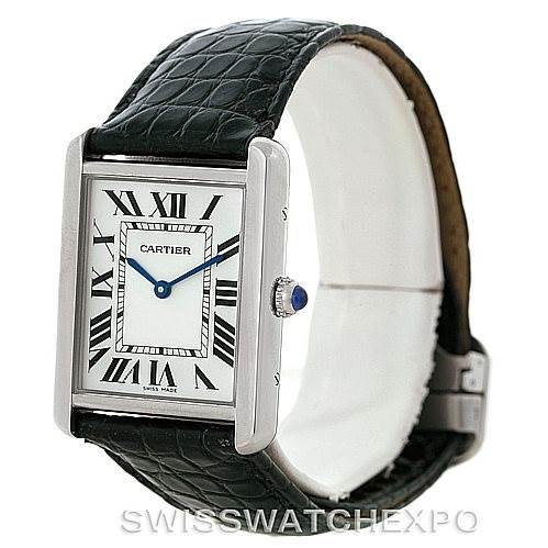 This image shows a Cartier Tank Solo W1018355 Men
s Stainless Steel Silver Dial W1018355 Men
s Stainless Steel Silver Dial watch at a slight angle, highlighting its rectangular face, Roman numerals, and black leather strap.