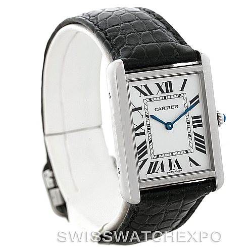 The image shows a side angle of the Cartier Tank Solo W1018355 Men
s Stainless Steel Silver Dial W1018355 Men
s Stainless Steel Silver Dial watch, highlighting the face with Roman numerals and the black leather strap.