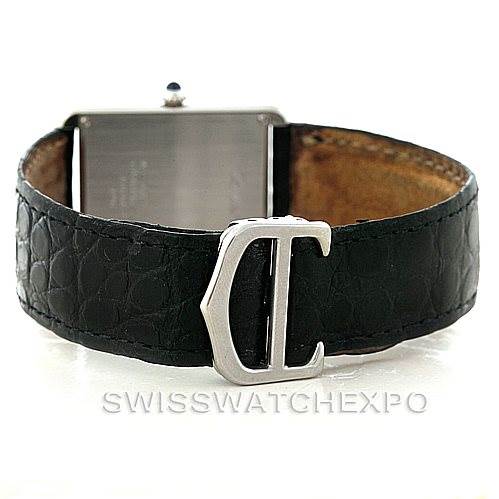 The image shows the rear view of the Cartier Tank Solo W1018355 Men
s Stainless Steel Silver Dial W1018355 Men
s Stainless Steel Silver Dial watch, highlighting its leather strap and metal clasp.