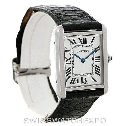 The image shows a Cartier Tank Solo W1018355 Men
s Stainless Steel Silver Dial W1018355 Men
s Stainless Steel Silver Dial watch at a slightly angled side view, highlighting the face, case, and black leather strap.