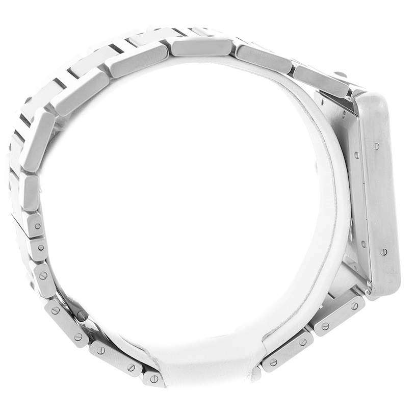 The image shows a side view of the Cartier Tank Solo W5200028 Men
s Stainless Steel Silver Dial W5200028 Men
s Stainless Steel Silver Dial watch band and part of the case.