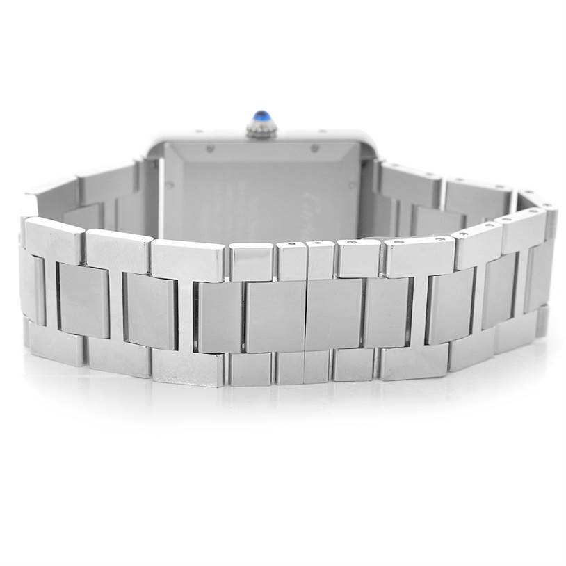 This image shows the back and bracelet of a Cartier Tank Solo W5200028 Men
s Stainless Steel Silver Dial W5200028 Men
s Stainless Steel Silver Dial watch with a focus on its metal links and crown.