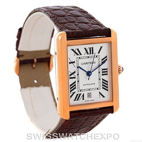 This image shows a Cartier Tank Solo W5200026 Men
s Steel and Gold (two tone) Silver Dial W5200026 Men
s Steel and Gold (two tone) Silver Dial watch from an angled view, highlighting the rectangular face, Roman numerals, and brown leather strap.