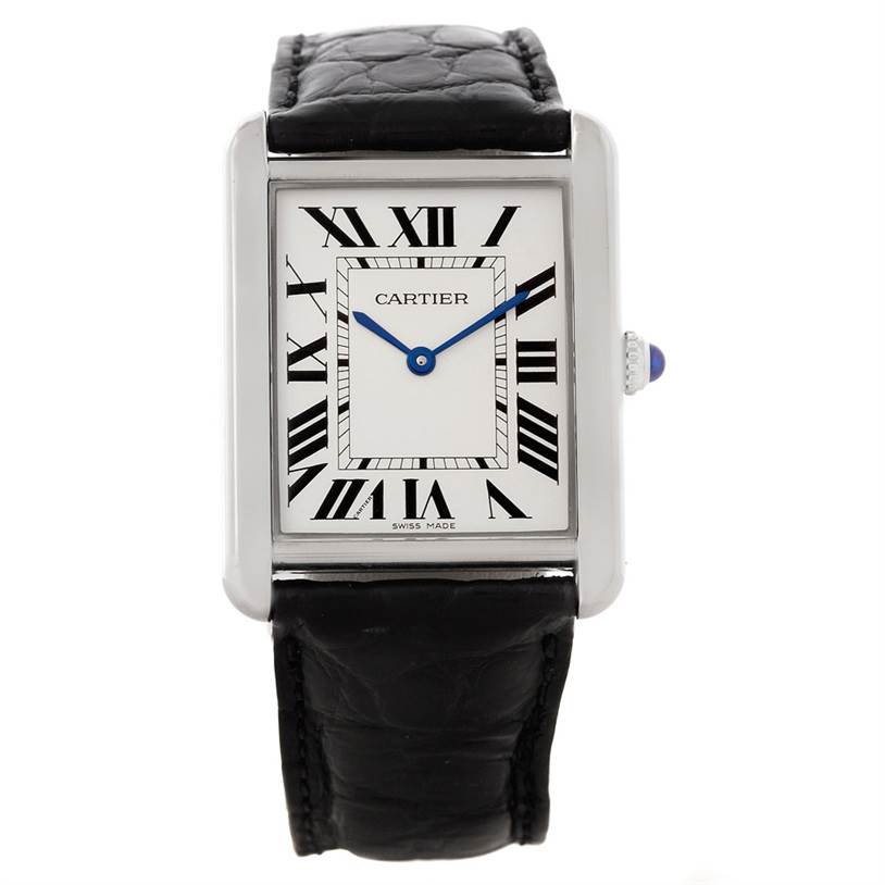 The image shows a front view of a Cartier Tank Solo W1018355 Men
s Stainless Steel Silver Dial W1018355 Men
s Stainless Steel Silver Dial watch, highlighting its rectangular face, Roman numerals, and black leather strap.