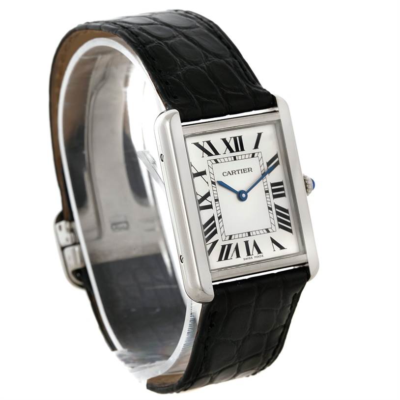 The image shows a Cartier Tank Solo W1018355 Men
s Stainless Steel Silver Dial W1018355 Men
s Stainless Steel Silver Dial watch at a slight side angle, highlighting its rectangular face and black leather strap.