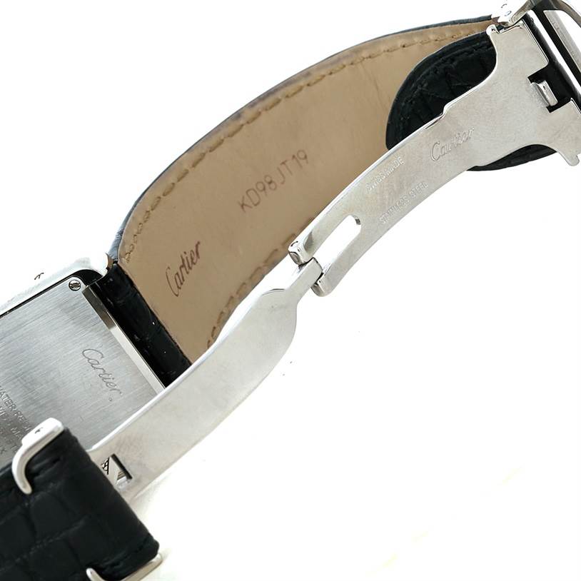 The image shows the back and clasp mechanism of a Cartier Tank Solo W1018355 Men
s Stainless Steel Silver Dial W1018355 Men
s Stainless Steel Silver Dial watch with part of its leather strap visible.