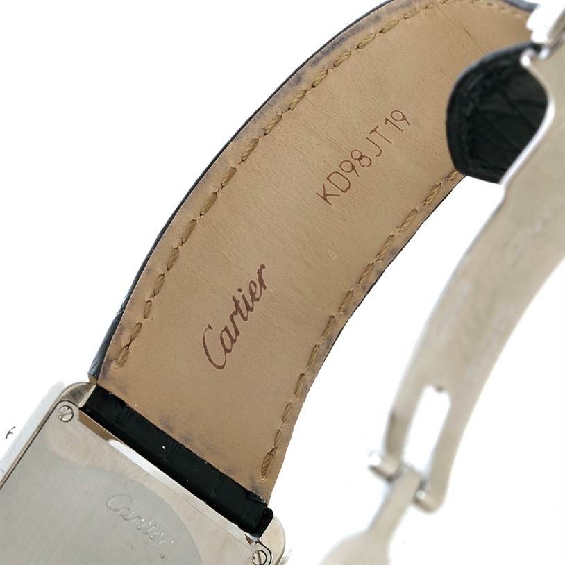 The image shows the underside of the strap and part of the back casing of a Cartier Tank Solo W1018355 Men
s Stainless Steel Silver Dial W1018355 Men
s Stainless Steel Silver Dial watch.