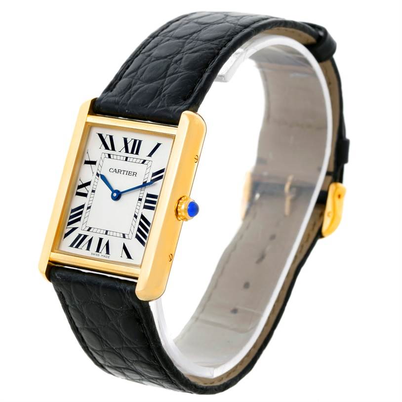 The image shows a Cartier Tank Solo W1018855 Men
s Steel and Gold (two tone) Silver Dial W1018855 Men
s Steel and Gold (two tone) Silver Dial watch at a slight angle, highlighting its face, gold case, black leather strap, and blue crown.