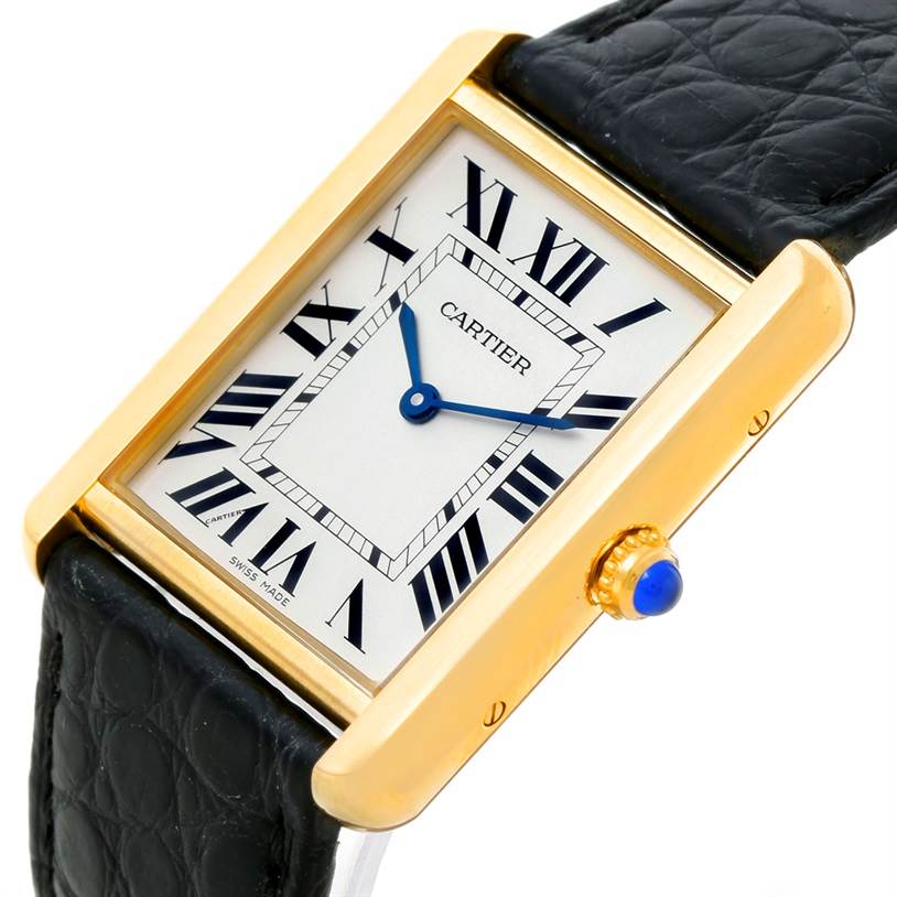The image shows a close-up frontal angle of the Cartier Tank Solo W1018855 Men
s Steel and Gold (two tone) Silver Dial W1018855 Men
s Steel and Gold (two tone) Silver Dial watch, displaying its face, leather strap, and crown.