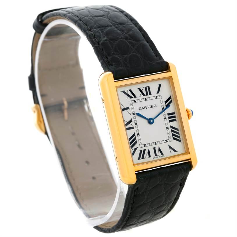 This image shows a Cartier Tank Solo W1018855 Men
s Steel and Gold (two tone) Silver Dial W1018855 Men
s Steel and Gold (two tone) Silver Dial watch at a slight angle, displaying its rectangular face, Roman numeral dial, and black leather strap.