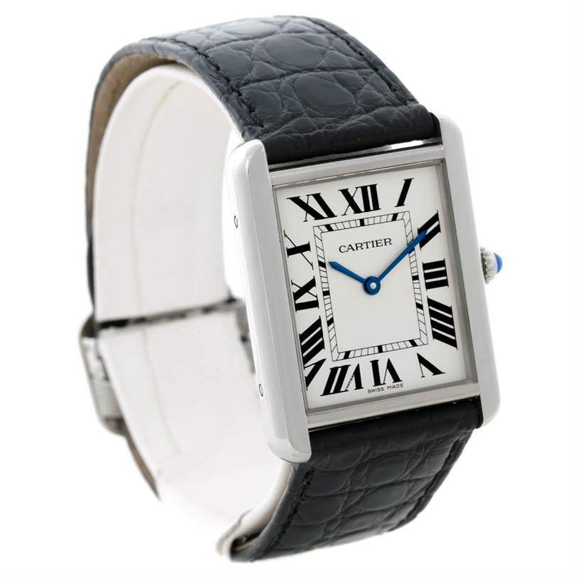 The image shows a Cartier Tank Solo W1018355 Men
s Stainless Steel Silver Dial W1018355 Men
s Stainless Steel Silver Dial watch from a three-quarter angle, highlighting its face, bezel, and black leather strap.