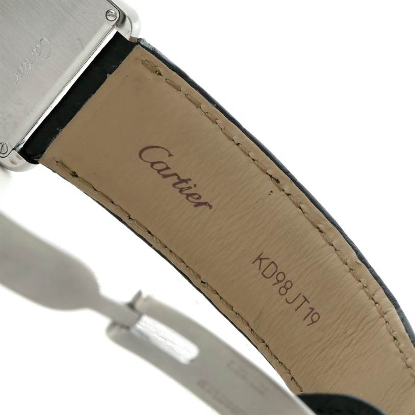 The image shows the inner side of the leather strap and part of the clasp of the Cartier Tank Solo W1018355 Men
s Stainless Steel Silver Dial W1018355 Men
s Stainless Steel Silver Dial watch.