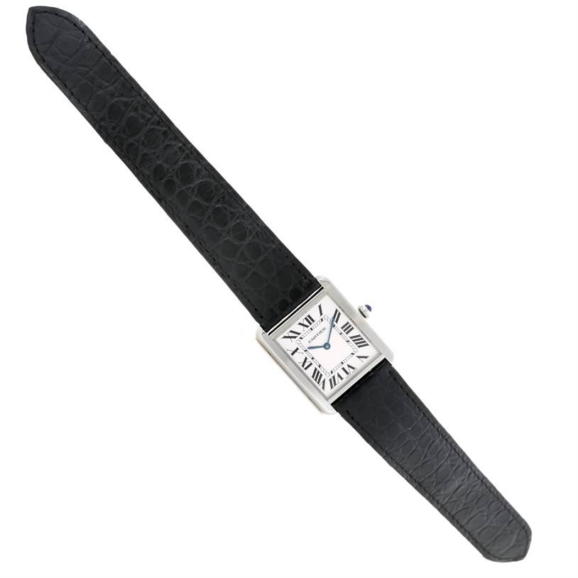 The image shows a Cartier Tank Solo W1018355 Men's Stainless Steel Silver Dial W1018355 Men's Stainless Steel Silver Dial watch with a black leather strap, viewed from a top-down angle.