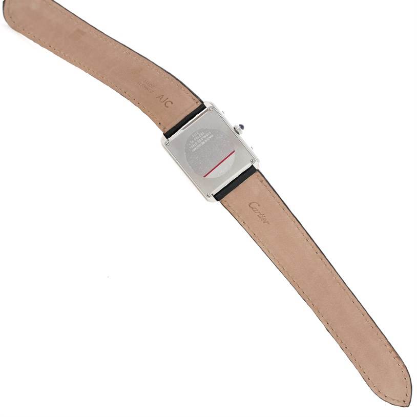 The image shows the back view of a Cartier Tank Solo W1018355 Men's Stainless Steel Silver Dial W1018355 Men's Stainless Steel Silver Dial watch with its leather strap fully extended.