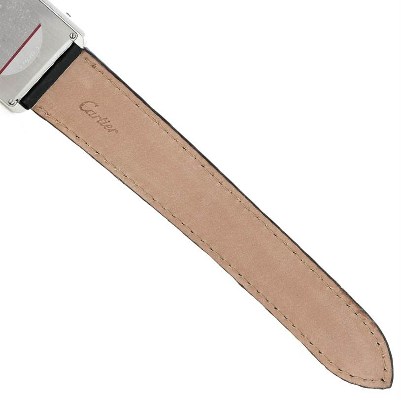 This image shows the back side of the leather strap and part of the case of a Cartier Tank Solo W1018355 Men's Stainless Steel Silver Dial W1018355 Men's Stainless Steel Silver Dial watch.