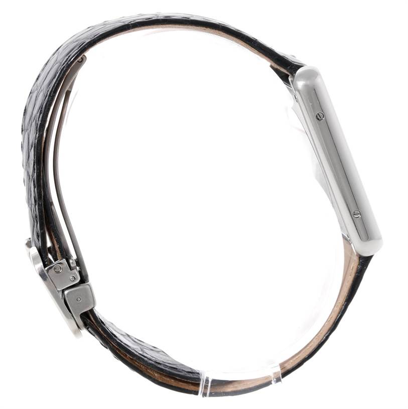 The image shows a side profile of a Cartier Tank Solo W1018355 Men's Stainless Steel Silver Dial W1018355 Men's Stainless Steel Silver Dial watch with a black leather strap and clasp.