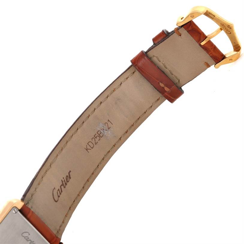 The image shows the strap and buckle of the Cartier Tank Solo W1018755 Women's Steel and Gold (two tone) Silver Dial W1018755 Women's Steel and Gold (two tone) Silver Dial watch, highlighting the underside and branding.