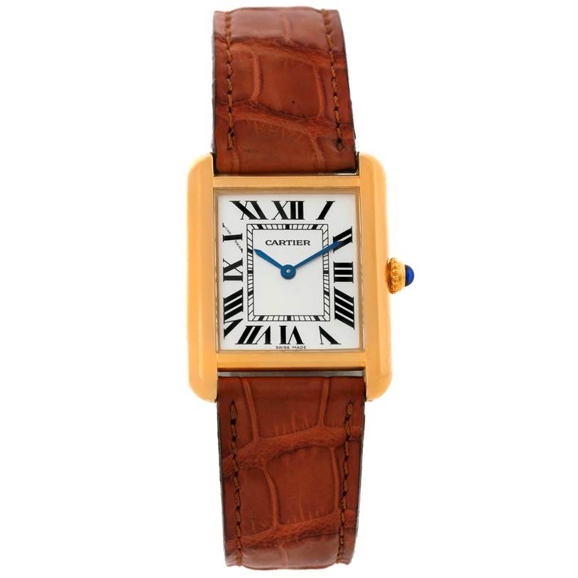 The Cartier Tank Solo W1018755 Women's Steel and Gold (two tone) Silver Dial W1018755 Women's Steel and Gold (two tone) Silver Dial watch is shown from the front, displaying its rectangular face, Roman numerals, and brown leather strap.
