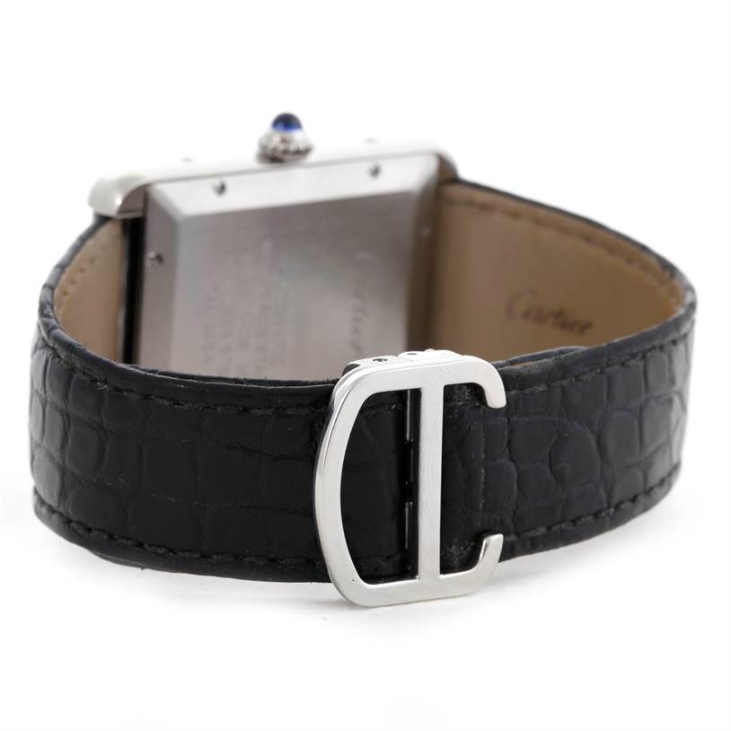 The image displays the back view of a Cartier Tank Solo W5200027 Men
s Stainless Steel Silver Dial W5200027 Men
s Stainless Steel Silver Dial watch, focusing on its black leather strap and buckle.