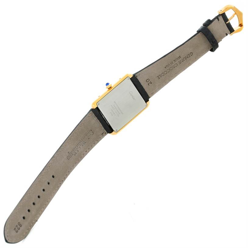 The image shows the back view of a Cartier Tank Solo W1018855 Men
s Steel and Gold (two tone) Silver Dial W1018855 Men
s Steel and Gold (two tone) Silver Dial watch, displaying the case back, strap, and buckle.