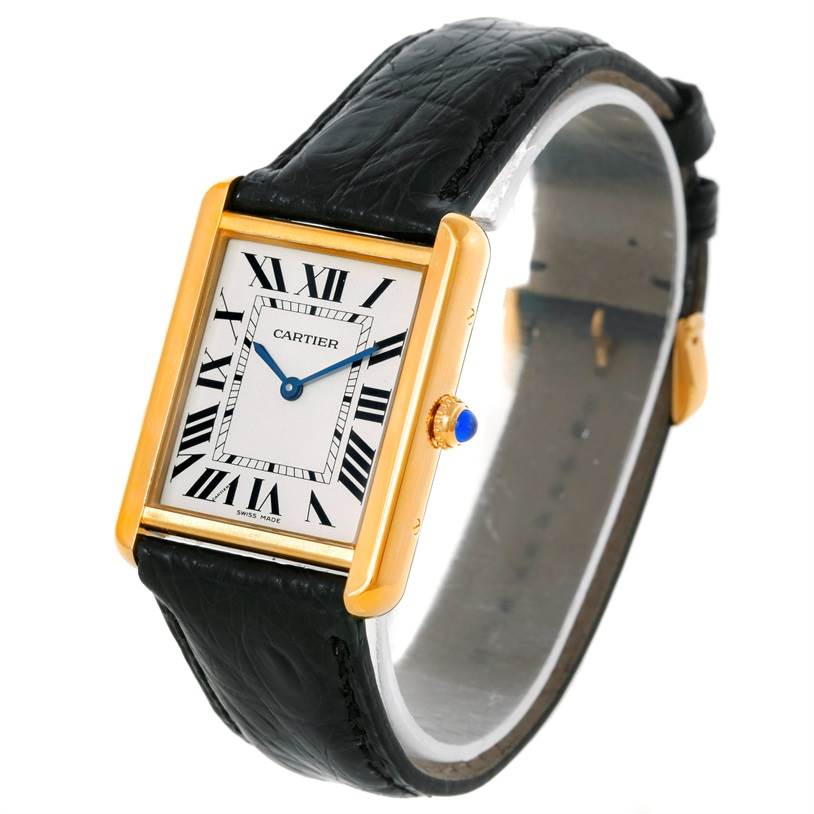 The watch is a Cartier Tank Solo W1018855 Men
s Steel and Gold (two tone) Silver Dial W1018855 Men
s Steel and Gold (two tone) Silver Dial model, shown at a slight angle, displaying the face, case, and strap.