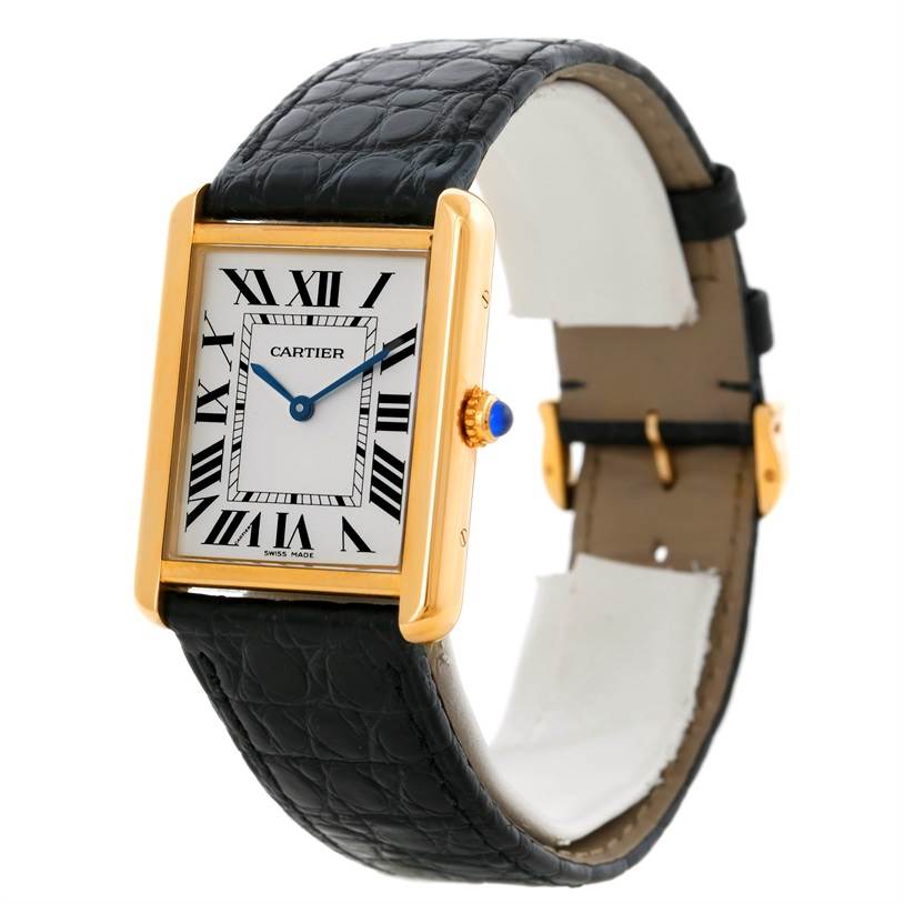 This image shows a Cartier Tank Solo W1018855 Men
s Steel and Gold (two tone) Silver Dial W1018855 Men
s Steel and Gold (two tone) Silver Dial watch at a three-quarter angle, highlighting the rectangular face, Roman numerals, and leather strap.