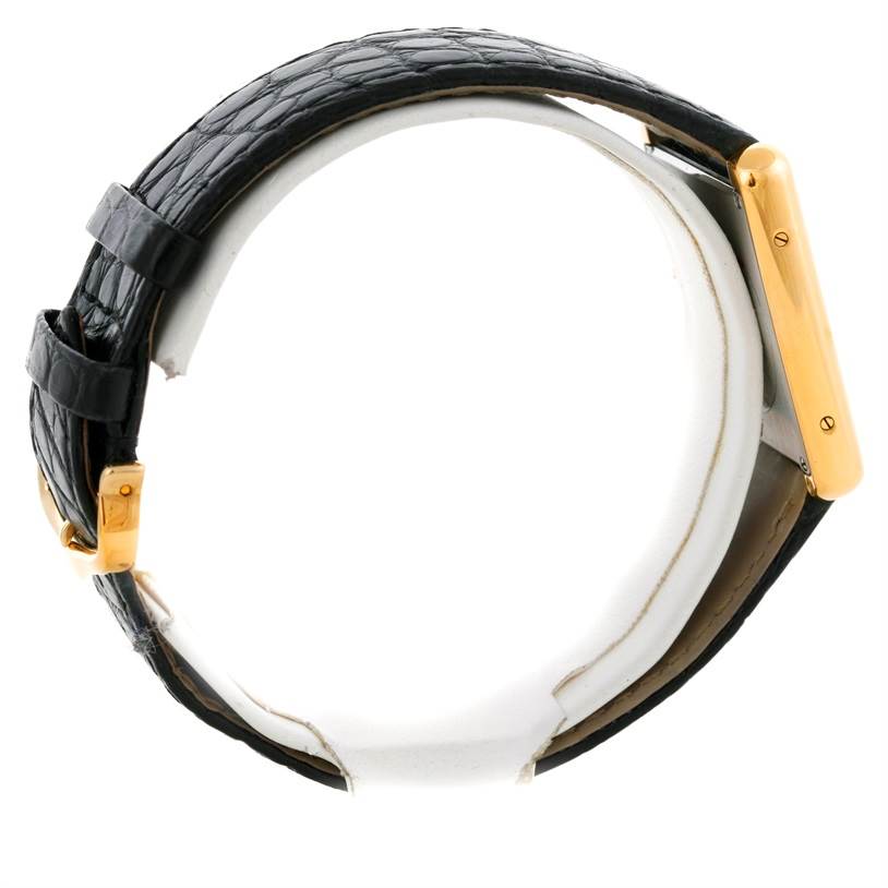 The image shows a side view of the Tank Solo model by Cartier, focusing on the strap and the side of the case.