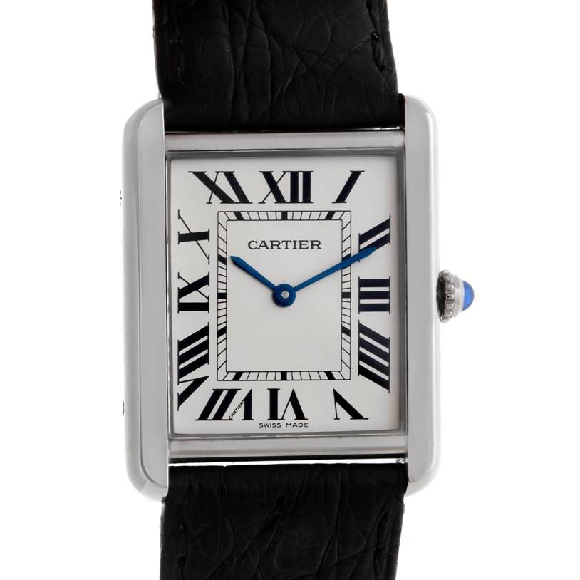 The image shows a frontal view of the Cartier Tank Solo W1018355 Men
s Stainless Steel Silver Dial W1018355 Men
s Stainless Steel Silver Dial watch, highlighting its rectangular face, Roman numerals, and leather strap.