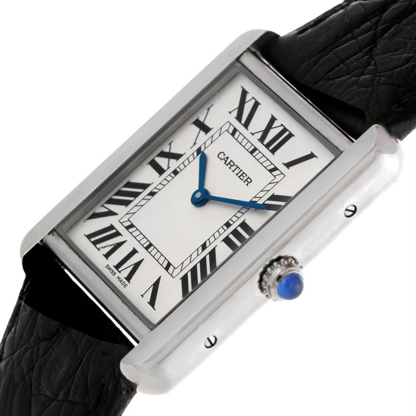 This is a side-angle view of the Cartier Tank Solo W1018355 Men
s Stainless Steel Silver Dial W1018355 Men
s Stainless Steel Silver Dial watch, showcasing its rectangular face, Roman numerals, leather strap, and sapphire crown.