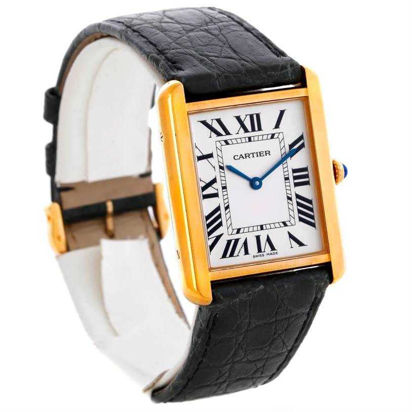 The image shows a Cartier Tank Solo W1018855 Men
s Steel and Gold (two tone) Silver Dial W1018855 Men
s Steel and Gold (two tone) Silver Dial watch at an angle, highlighting its rectangular face, Roman numerals, and black leather strap.