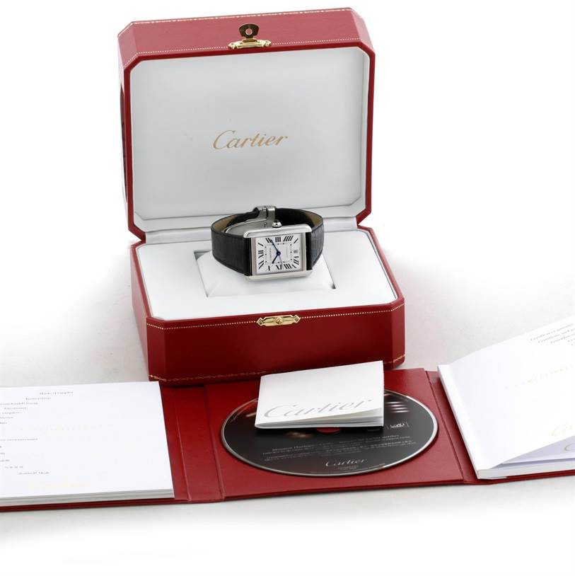 The Cartier Tank Solo W5200027 Men
s Stainless Steel Silver Dial W5200027 Men
s Stainless Steel Silver Dial watch is shown front-facing inside its box, with accompanying documents and CD displayed.