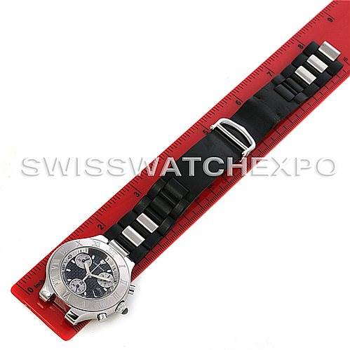 This image shows a Cartier Must 21 Chronoscaph W10125U2 Men
s Stainless Steel Black Dial W10125U2 Men
s Stainless Steel Black Dial watch, laid flat on a red ruler, highlighting the watch face and full strap.