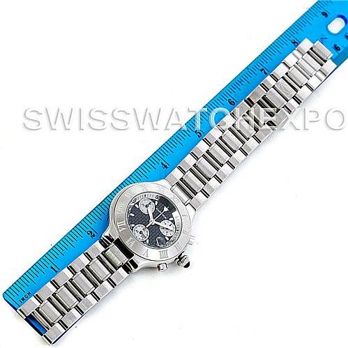 The image shows a top-view angle of the Cartier Must 21 Chronoscaph W10172T2 Men
s Stainless Steel Black Dial W10172T2 Men
s Stainless Steel Black Dial watch, featuring its face, bezel, and entire metal bracelet, measured by a ruler.