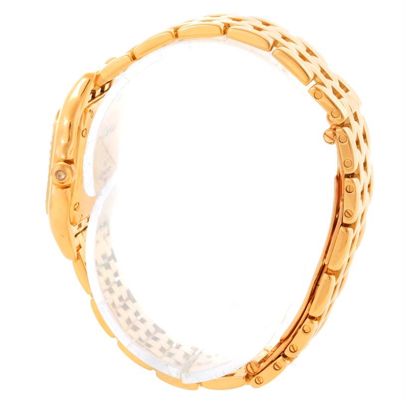 This image shows a side view of the Cartier Panthere WF3070B9 Yellow Gold Silver Dial WF3070B9 Yellow Gold Silver Dial watch, highlighting its gold bracelet and case.