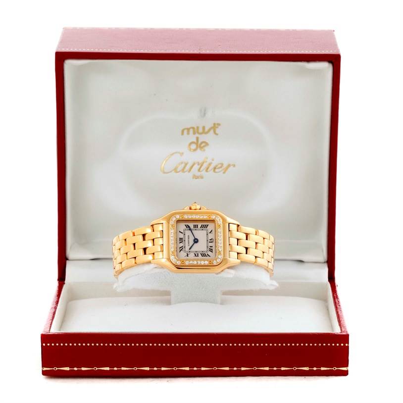 The Cartier Panthere WF3070B9 Yellow Gold Silver Dial WF3070B9 Yellow Gold Silver Dial watch is shown front-facing inside its branded open box.