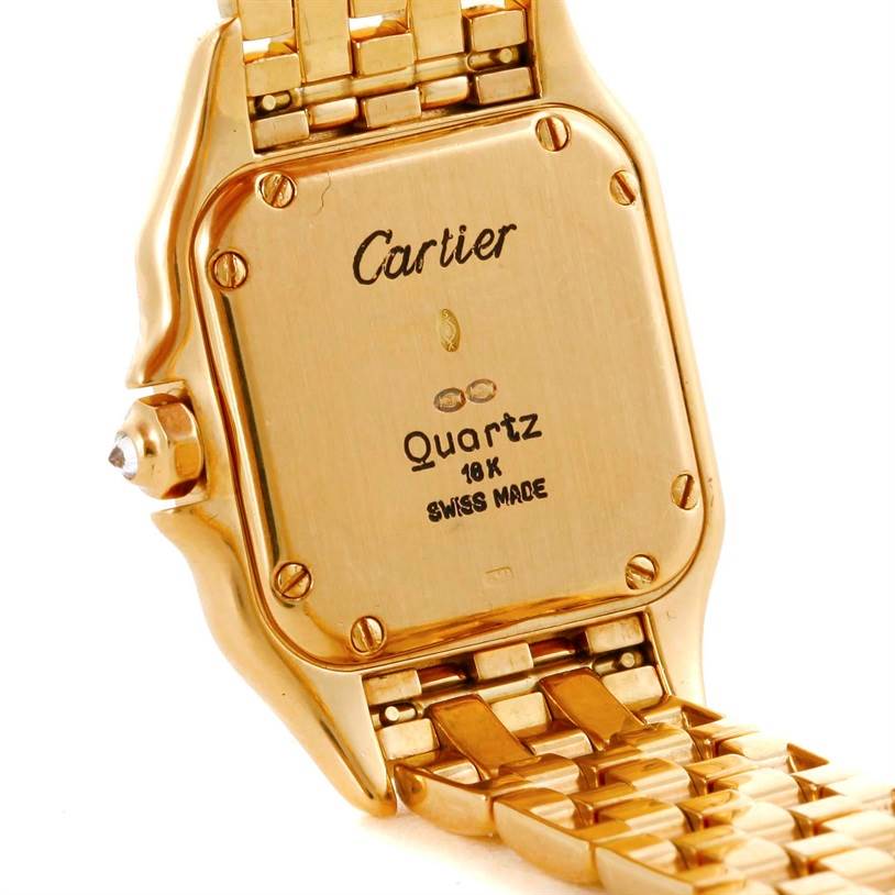 This image shows the back case and part of the bracelet of a Cartier Panthere WF3070B9 Yellow Gold Silver Dial WF3070B9 Yellow Gold Silver Dial watch, highlighting the brand and specifications.