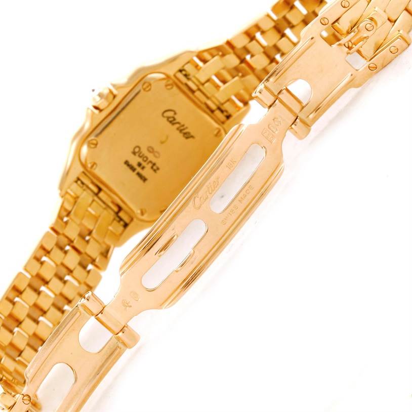 The image shows the backside and clasp of a Cartier Panthere WF3070B9 Yellow Gold Silver Dial WF3070B9 Yellow Gold Silver Dial watch, highlighting its gold case and bracelet.