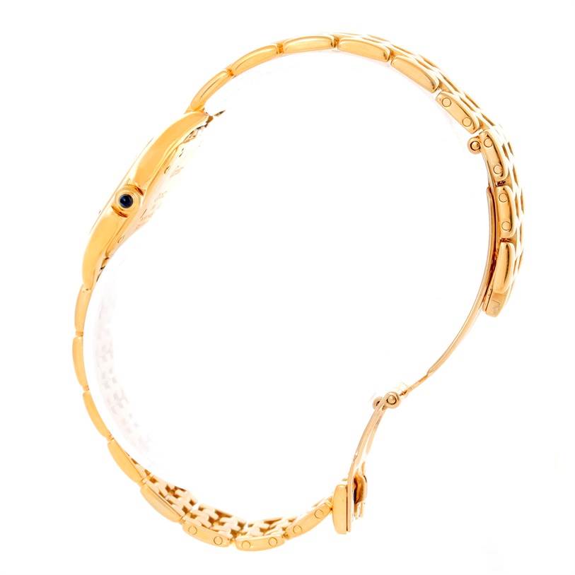 This image shows a side profile of the Cartier Panthere W25022B9 Women's Yellow Gold Silver Dial W25022B9 Women's Yellow Gold Silver Dial watch, highlighting its gold bracelet and case.