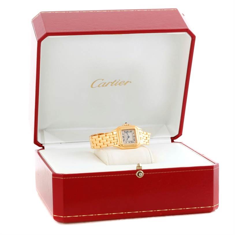 The Cartier Panthere W25022B9 Women's Yellow Gold Silver Dial W25022B9 Women's Yellow Gold Silver Dial watch is shown from a front angle, inside its opened red and white box.