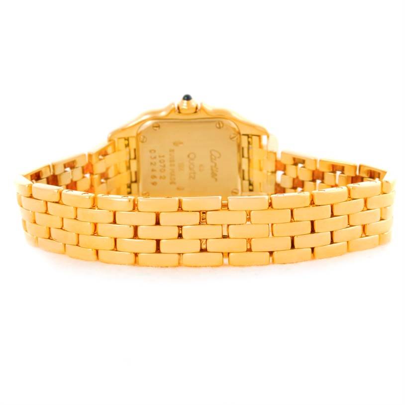 The image shows the back view of a Cartier Panthere W25022B9 Women's Yellow Gold Silver Dial W25022B9 Women's Yellow Gold Silver Dial watch, highlighting its gold case and bracelet.