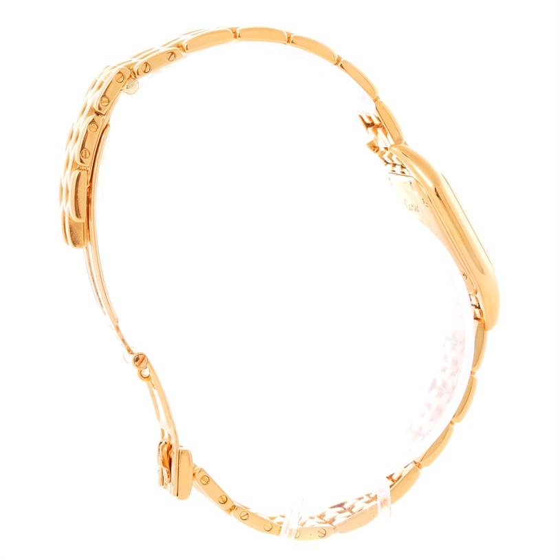 The side profile of the Cartier Panthère watch is shown, highlighting its gold bracelet and case.