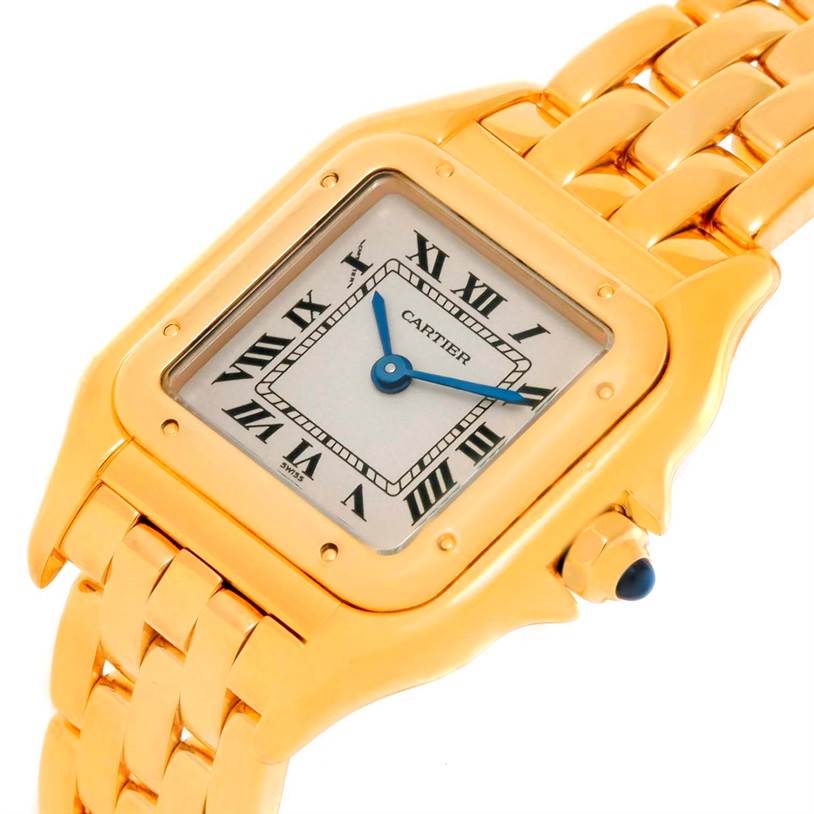 This image shows a close-up angle of the Cartier Panthère watch, focusing on its face, crown, and bracelet.