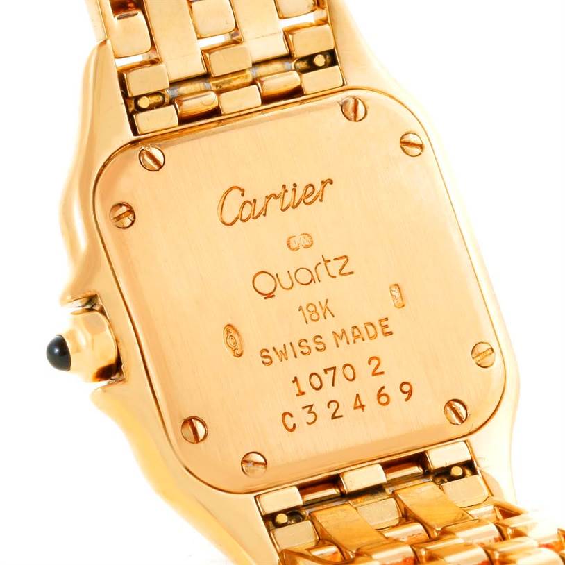This image shows the back of a Cartier Panthere W25022B9 Women's Yellow Gold Silver Dial W25022B9 Women's Yellow Gold Silver Dial model watch, highlighting the clasp and case back with engravings.