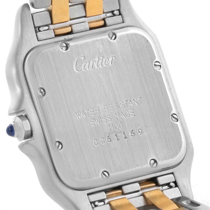 The image shows the back case and part of the bracelet of a Panthere model by Cartier.