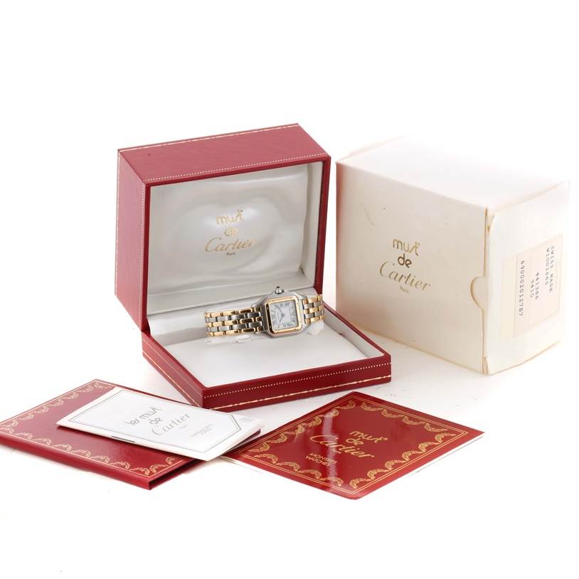 The photo shows a Cartier Panthere W25029B6 Women's Stainless Steel Beige Dial W25029B6 Women's Stainless Steel Beige Dial watch in its red box, surrounded by its white outer box, booklet, and documentation.