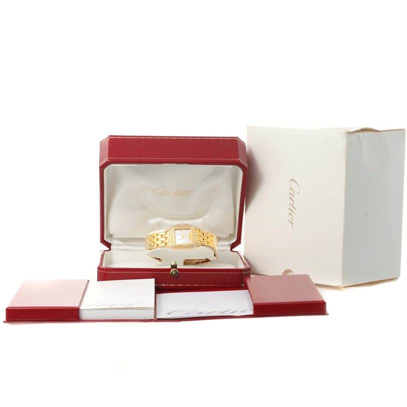 The image shows a Cartier Panthere 8057915 Women's Yellow Gold Mother of Pearl Dial 8057915 Women's Yellow Gold Mother of Pearl Dial model watch displayed in an open red case with accompanying packaging and documents.