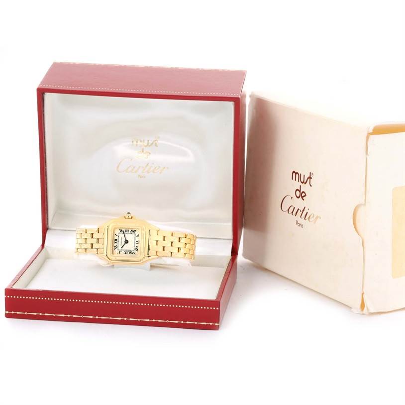The Cartier Panthere W25022B9 Women's Yellow Gold Silver Dial W25022B9 Women's Yellow Gold Silver Dial watch is shown from the front, resting in an open red box with the outer box beside it.