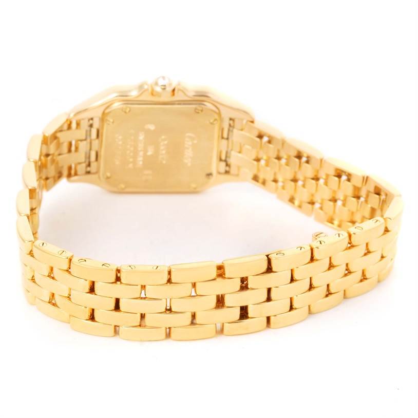 The image shows the back view of the Cartier Panthere W25022B9 Women's Yellow Gold Mother of Pearl Dial W25022B9 Women's Yellow Gold Mother of Pearl Dial watch, highlighting the gold bracelet and case back.