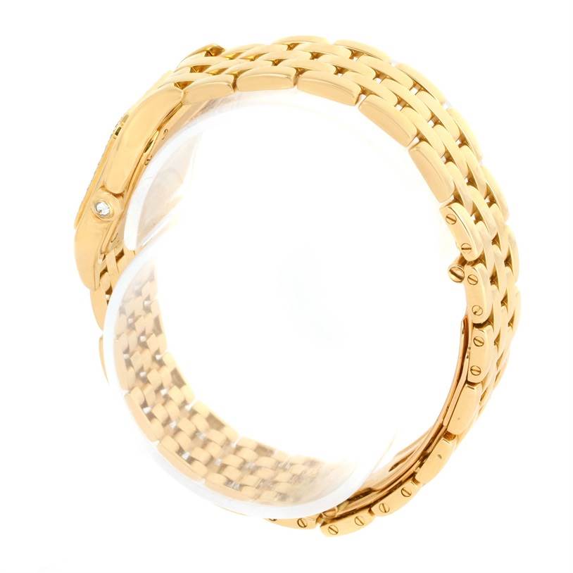 This image shows a side view of the gold bracelet of a Cartier Panthere WF3070B9 Women's Yellow Gold Silver Dial WF3070B9 Women's Yellow Gold Silver Dial model watch, highlighting its intricate links and clasp.