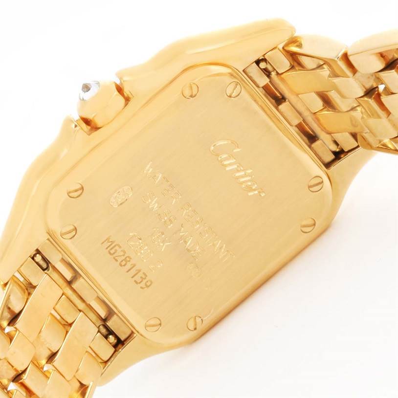 The image shows the back case and part of the bracelet of a Cartier Panthere WF3070B9 Women's Yellow Gold Silver Dial WF3070B9 Women's Yellow Gold Silver Dial model watch at an angle.